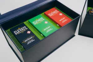 Open Hat Trick box with three colored vape boxes
